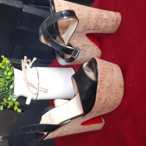 CHRISTIAN LOUBOUTIN PLATFORM HEELS